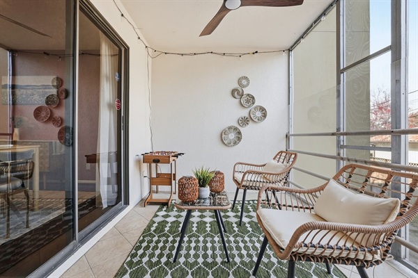 Spacious private balcony with direct access from the kitchen and Bedroom 4, complete with cozy string lights and a mini foosball table — perfect for evening gatherings or casual games.