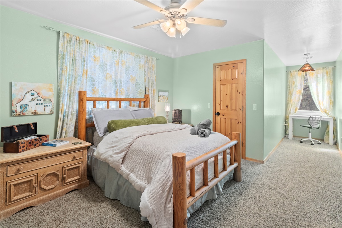 Guest room upstairs offers queen size comfort