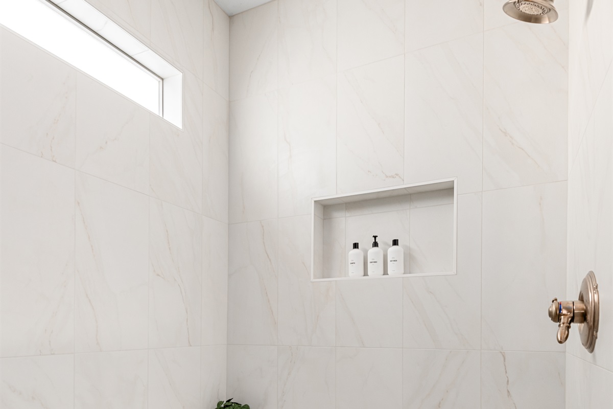 Primary En Suite Bathroom: Large, Walk-in Shower with Public Goods Amenities.