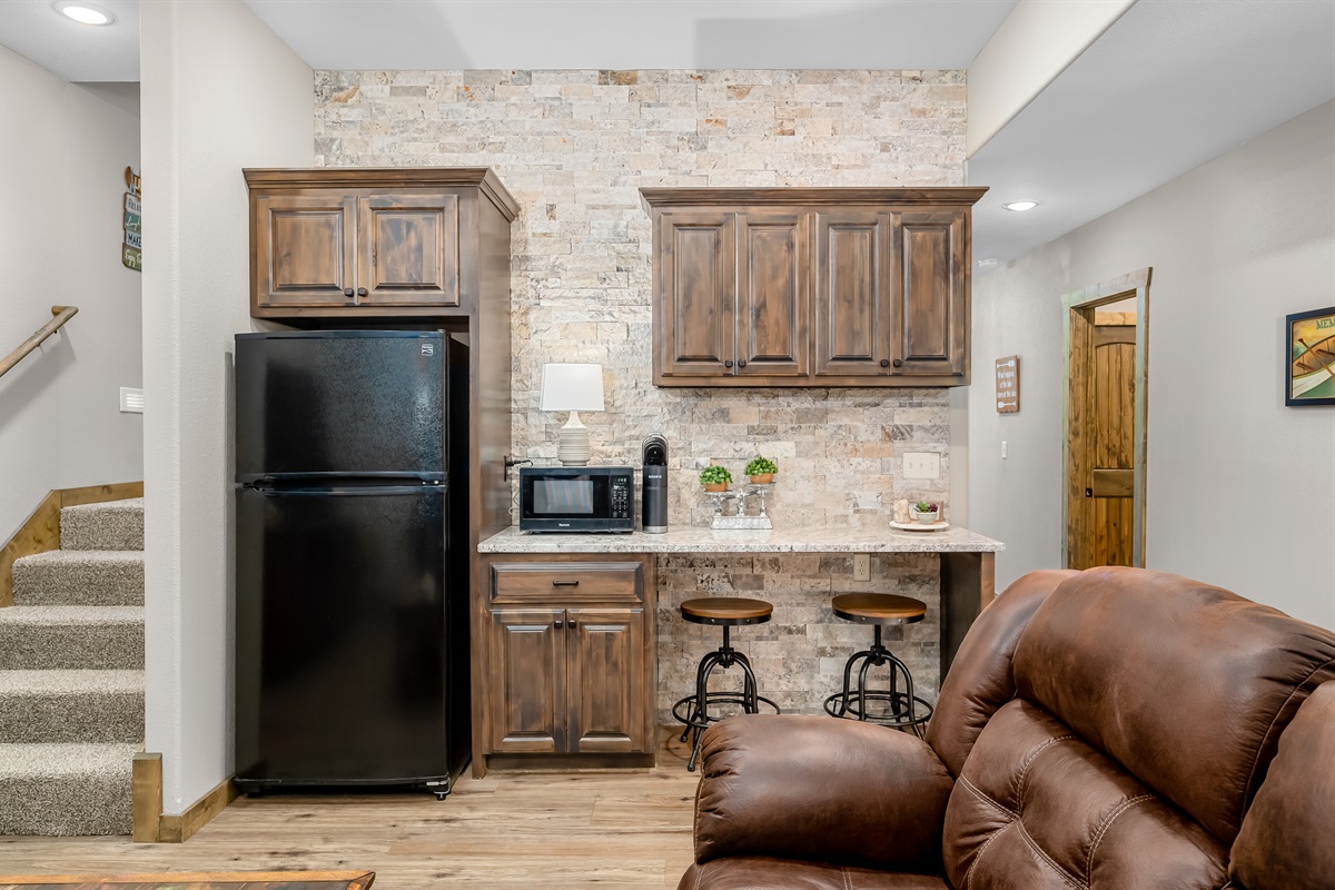 Lower level fridge and microwave along with Keurig for popcorn and hot chocolate!