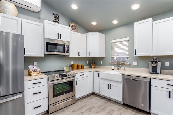 Expansive kitchen stocked with the essentials.  