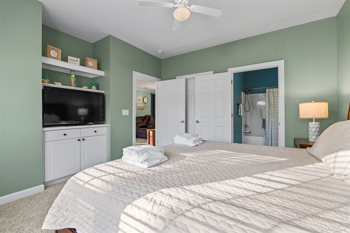 Large TV in the Main Bedroom