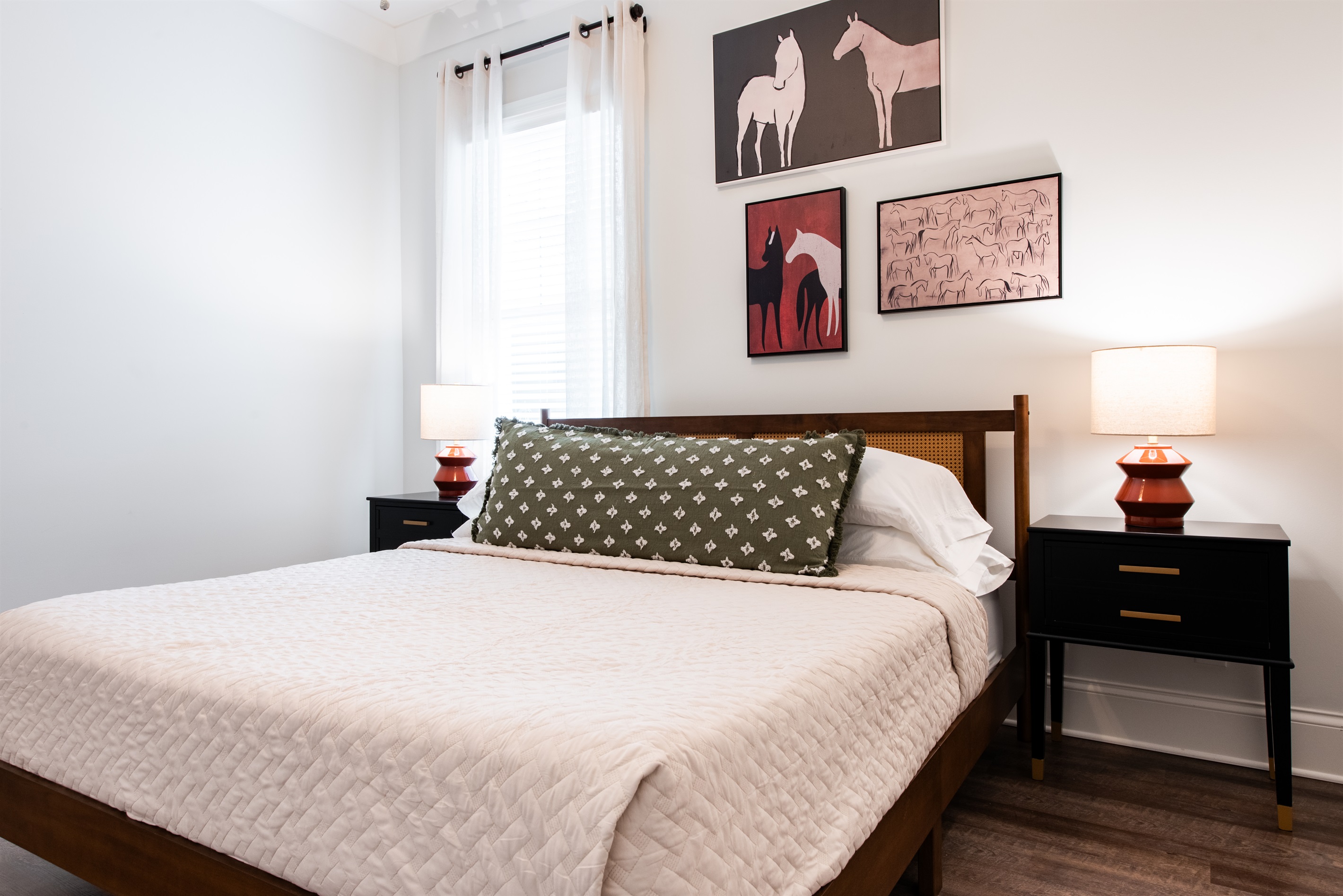 Cozy bed with fluffy pillows and warm blankets, ideal for a peaceful sleep.