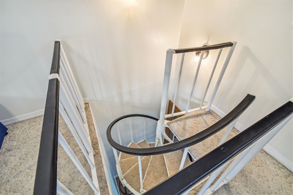 Spiral staircase to the loft.