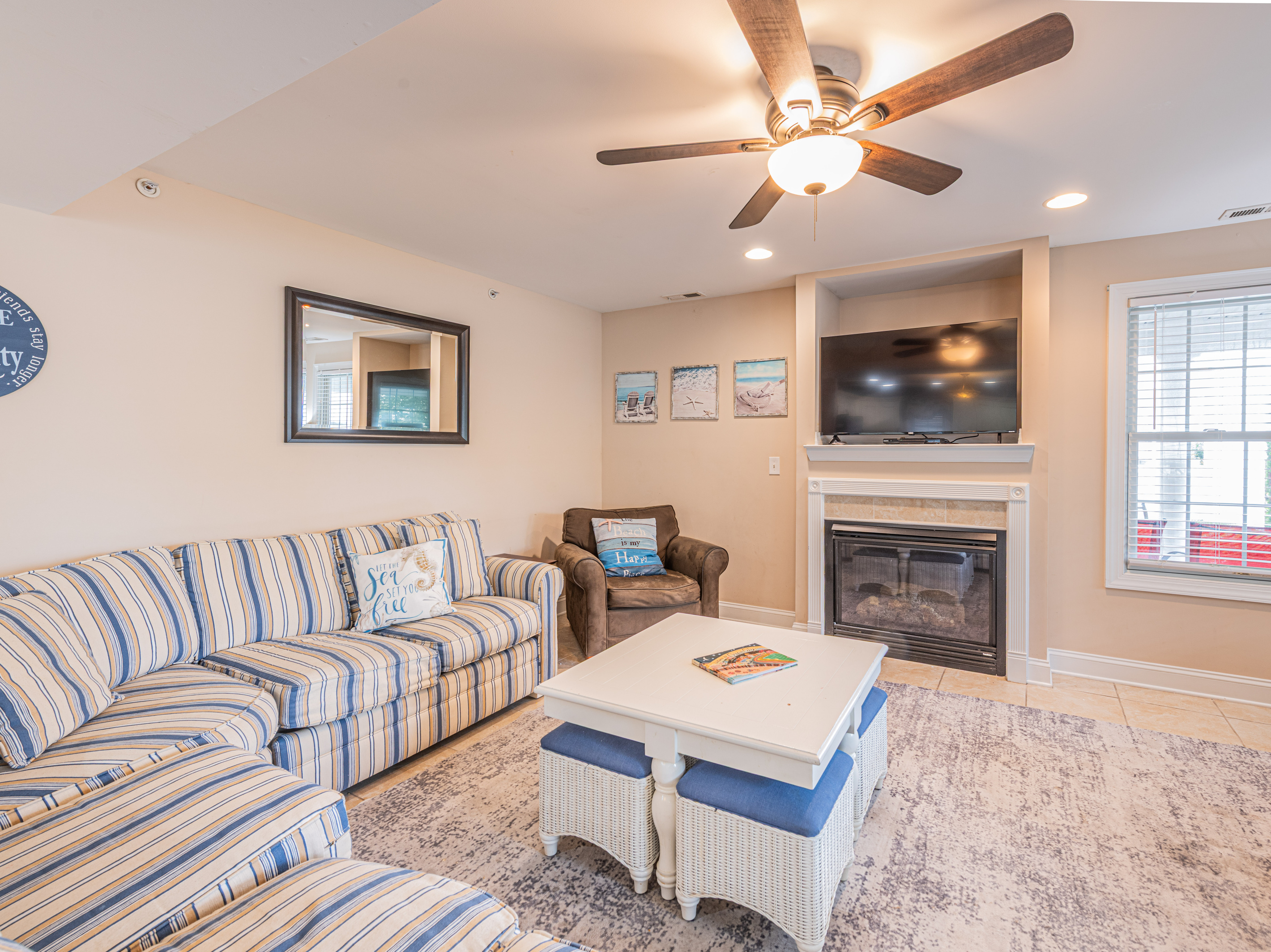 Cozy Living Room with Fireplace and Plush Armchairs