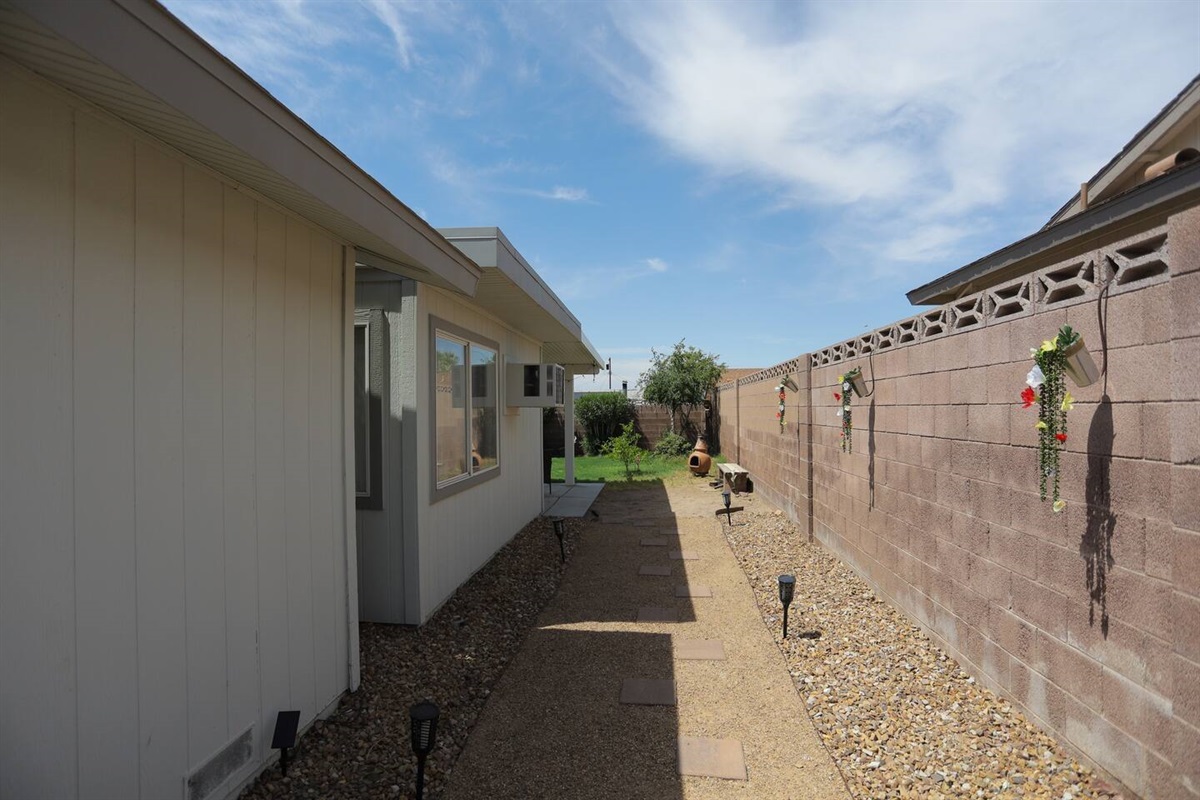 Paver stones lead you right to your green and lush patio