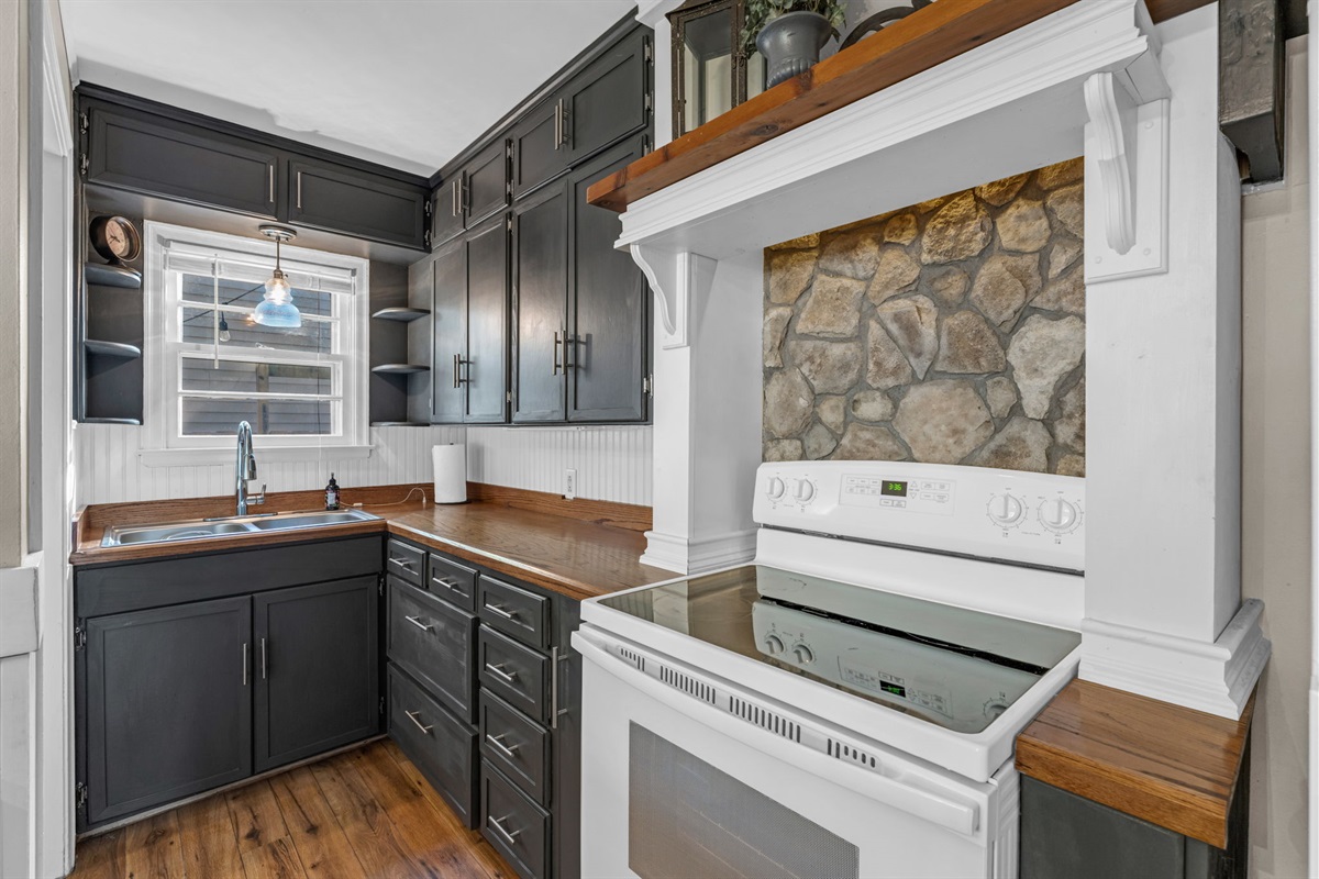 Another view of our clean, well-maintained kitchen — ready for your cooking needs.