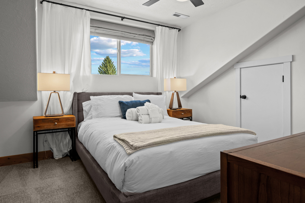 The 3rd bedroom features a queen bedroom retreat with plenty of natural light.