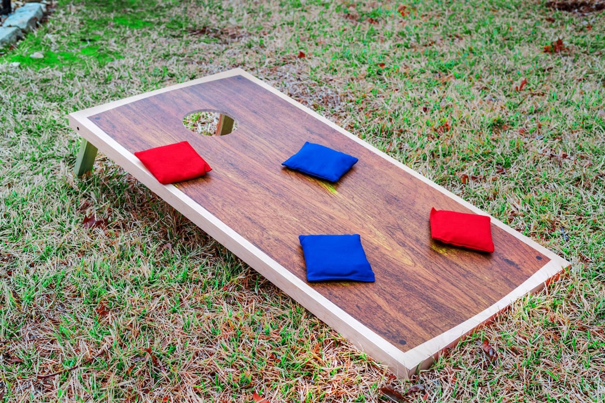 Unwind with a friendly game of cornhole—perfect for backyard hangs and sunny afternoon fun.