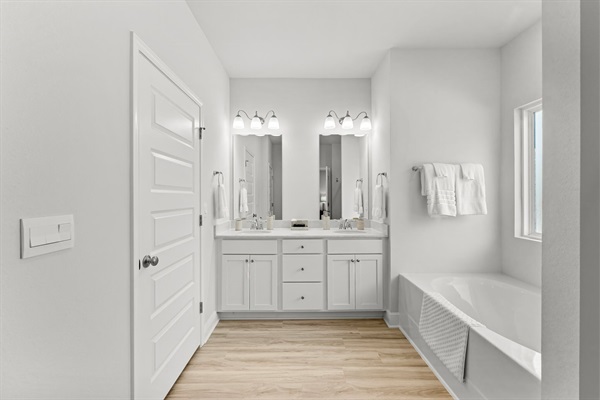 Double sink vanity in the primary bathroom