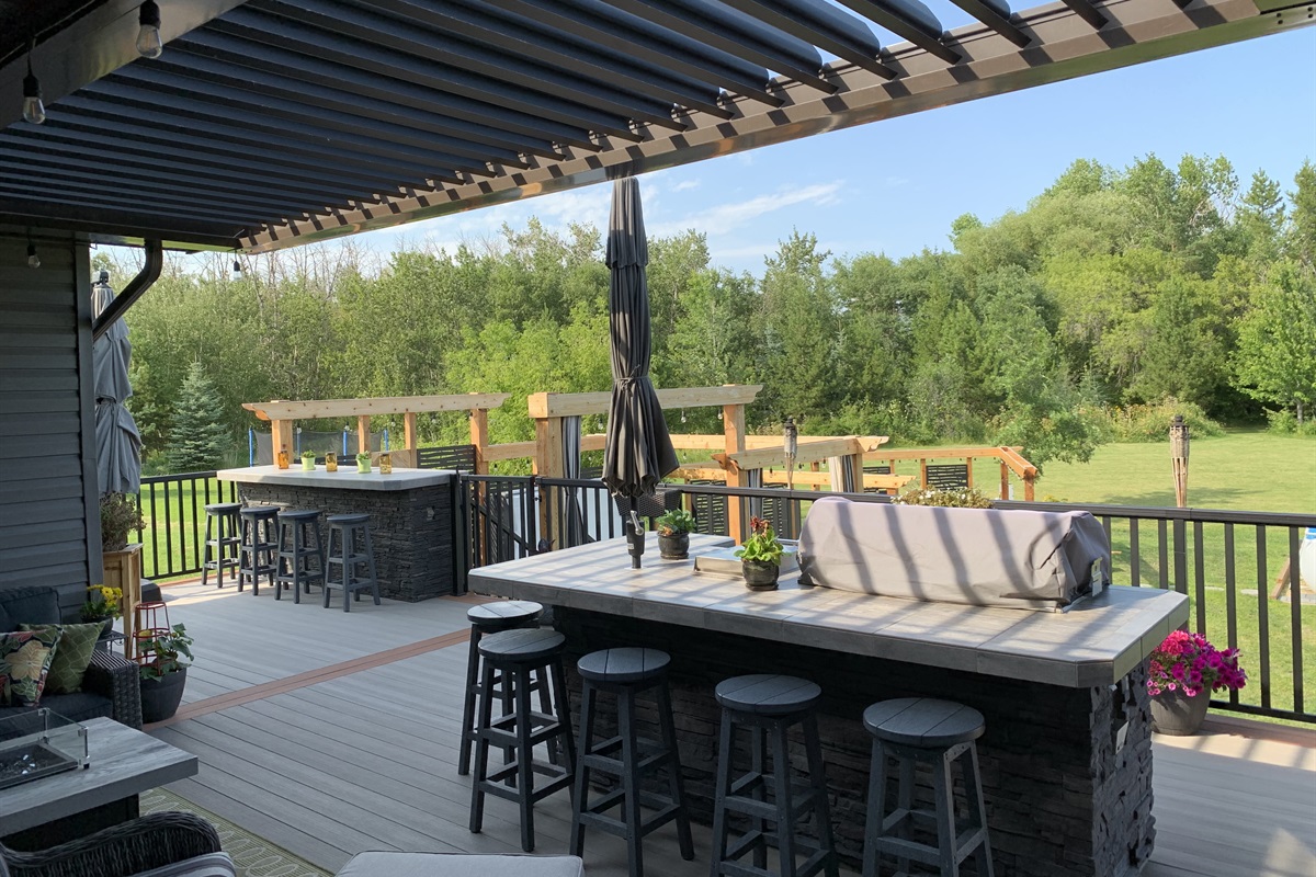 UPPER DECK COMMON SPACES. SEATING FOR 6 AT BBQ AND 4 AT EATING BAR.