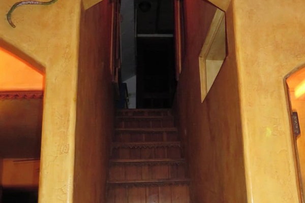 Stairs to bedroom #3 off the living room.