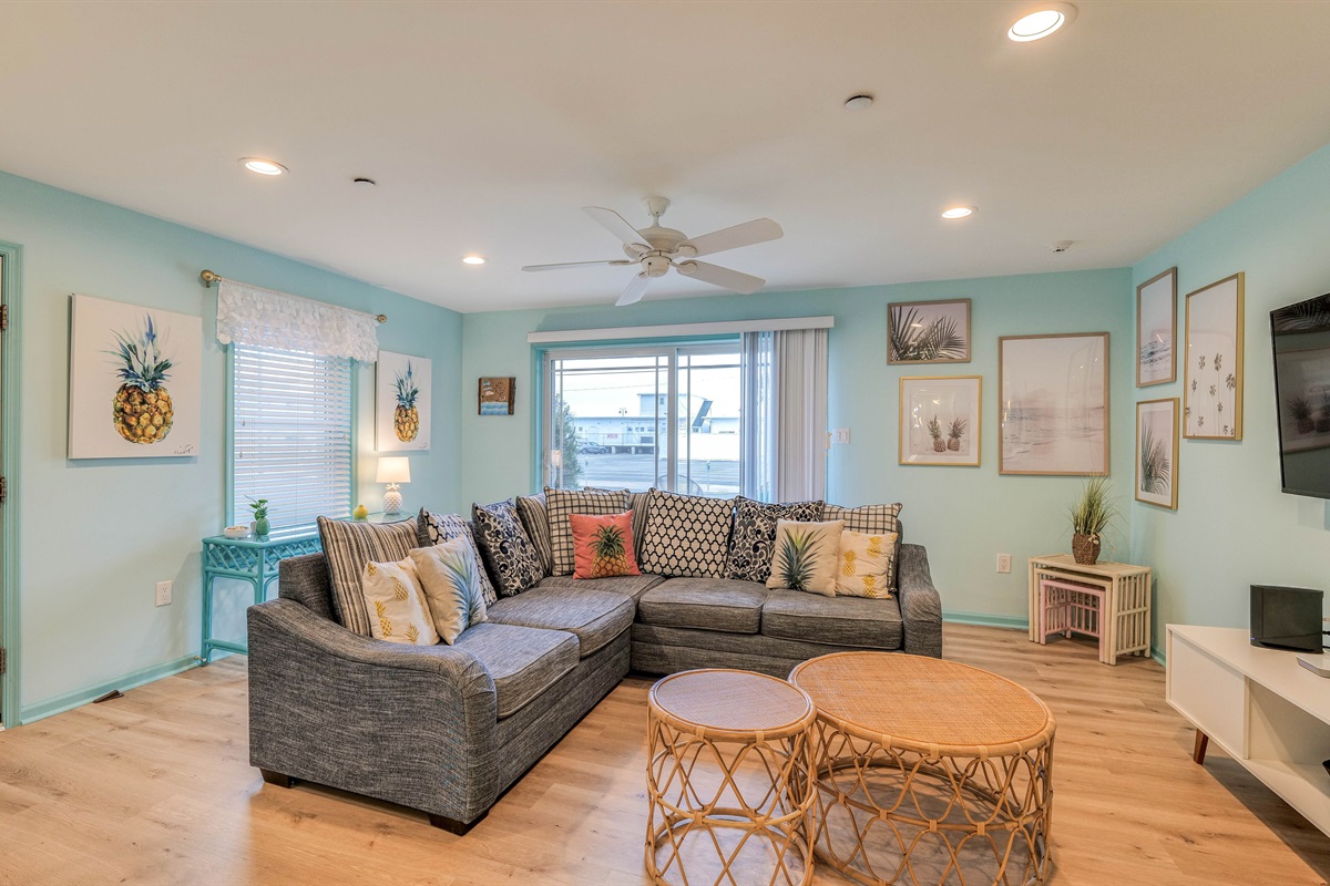 Living room area with plush seating and cute coffee tables