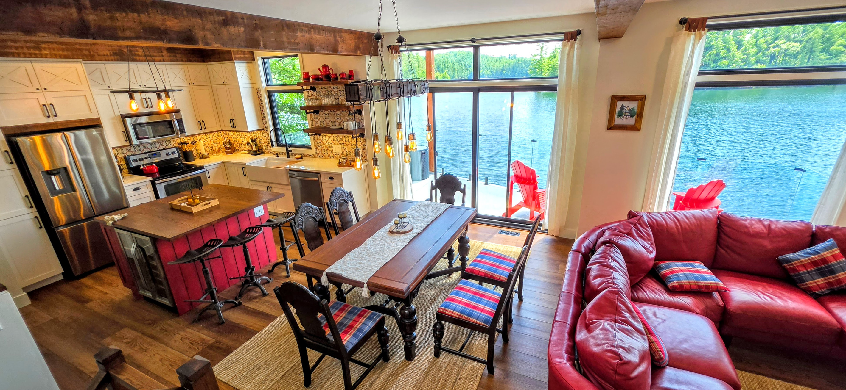 Dining room with adjacent kitchen and doors to balcony and hot tub