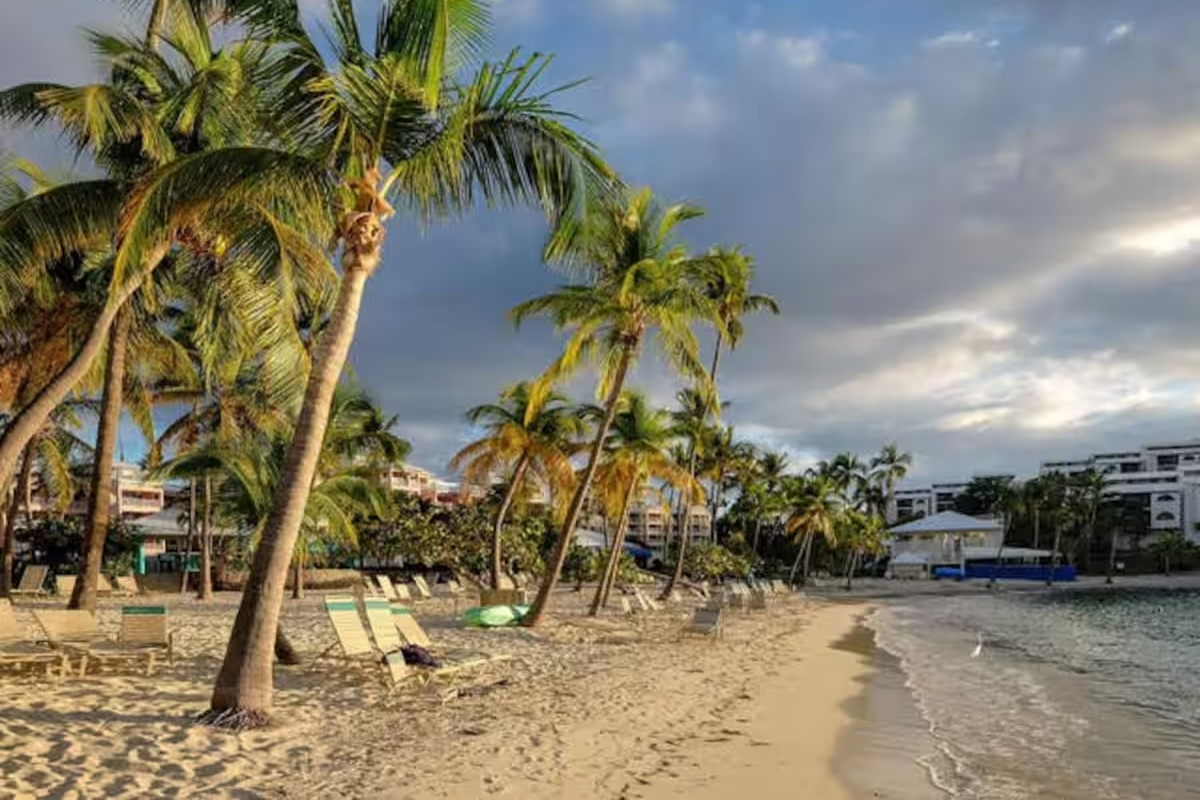Soft white sand and crystal-clear water await just steps away.