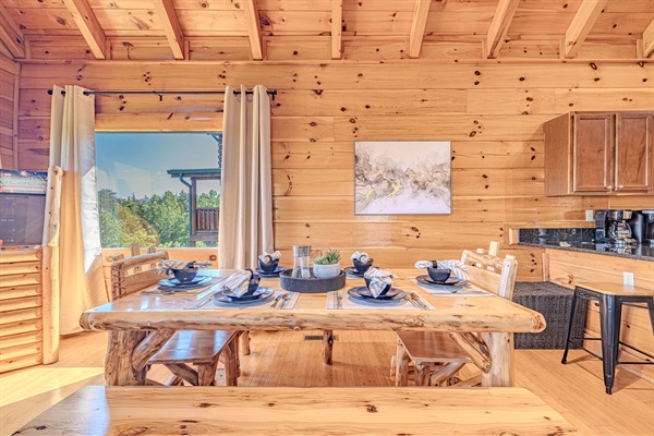 Gather 'round! Our dining table offers seating for six, plus extra spots at the breakfast bar – perfect for meals, games, and conversations.