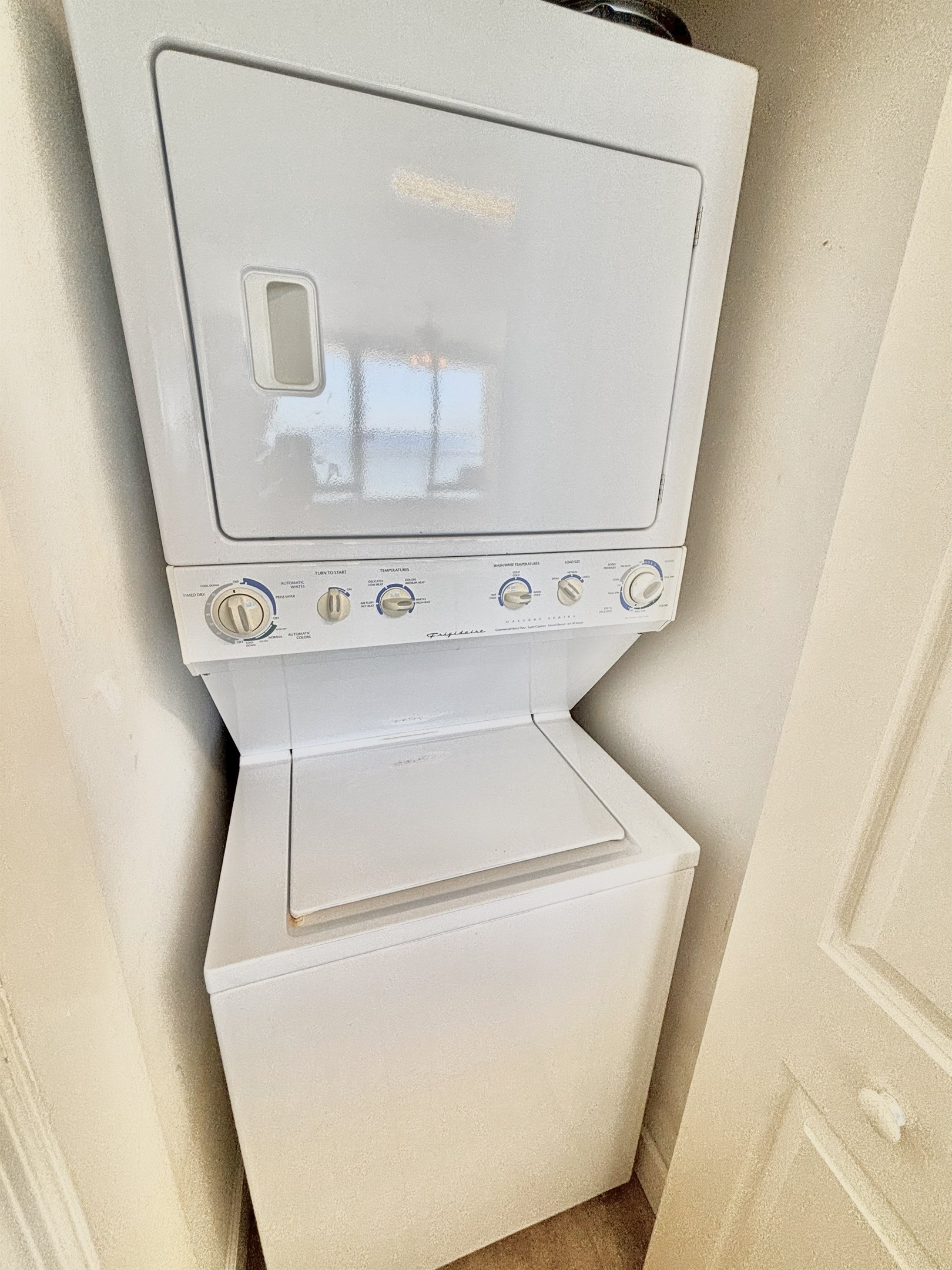 Stacked washer and dryer in unit!