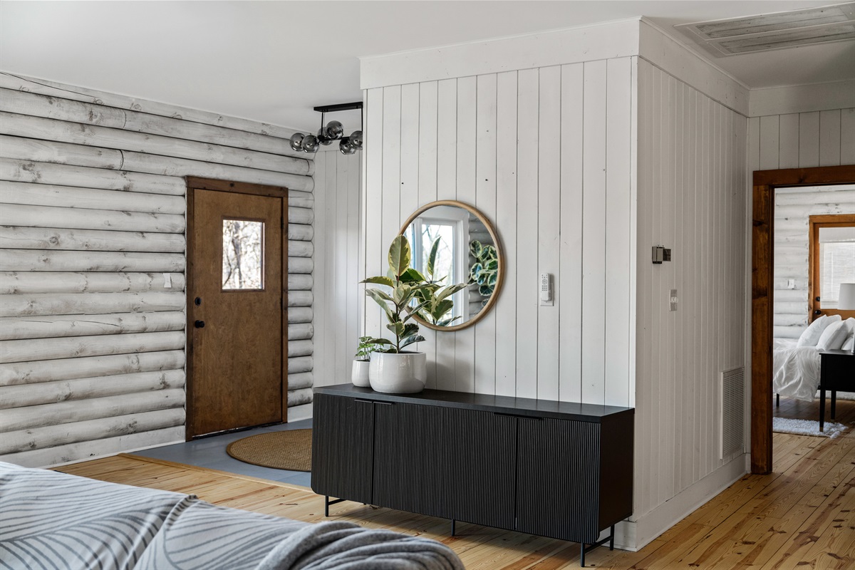 Entryway: Bright and inviting, featuring natural wood accents and stylish decor for a warm welcome!