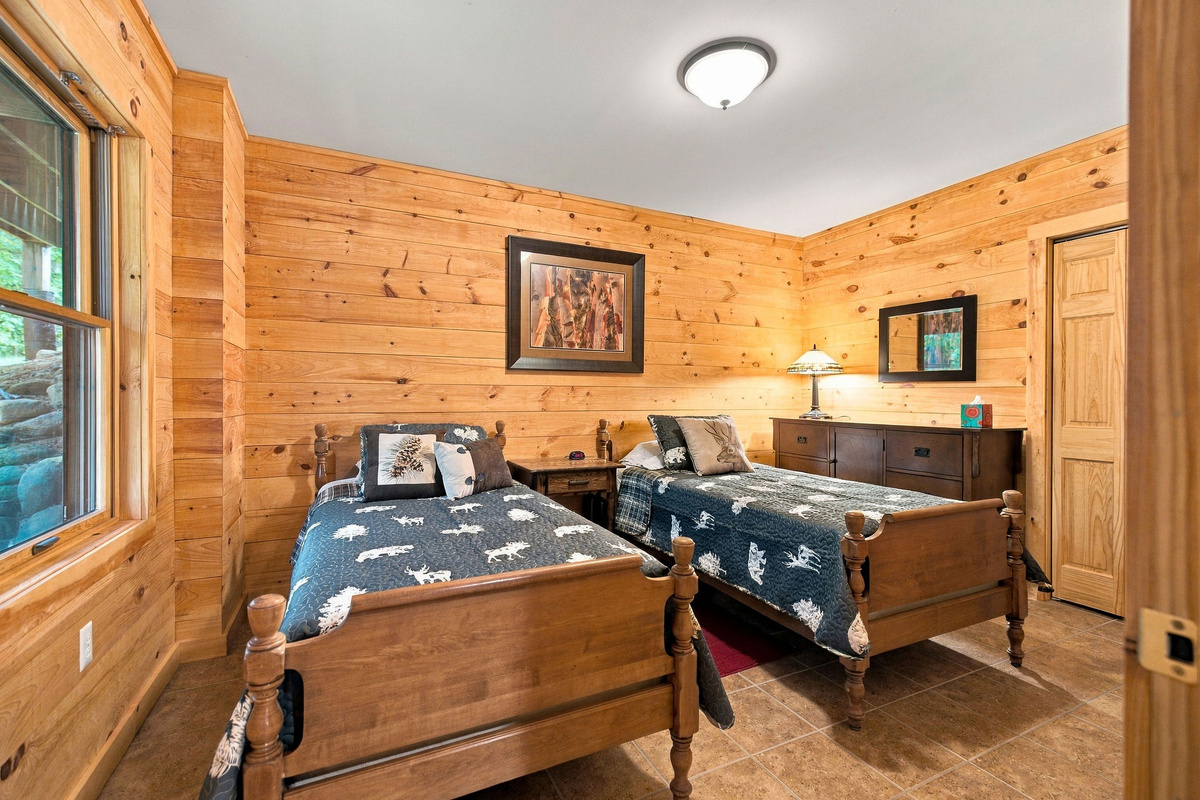 This cheerful twin bedroom creates a cozy sleeping space for two.