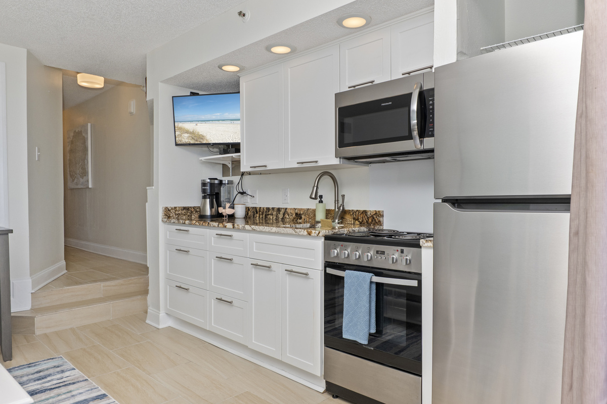 Convenient to go out to eat and stay in and cook in the condo. Full-sized refrigerator, microwave, oven/stove, and coffee options for pot or k-cups. 