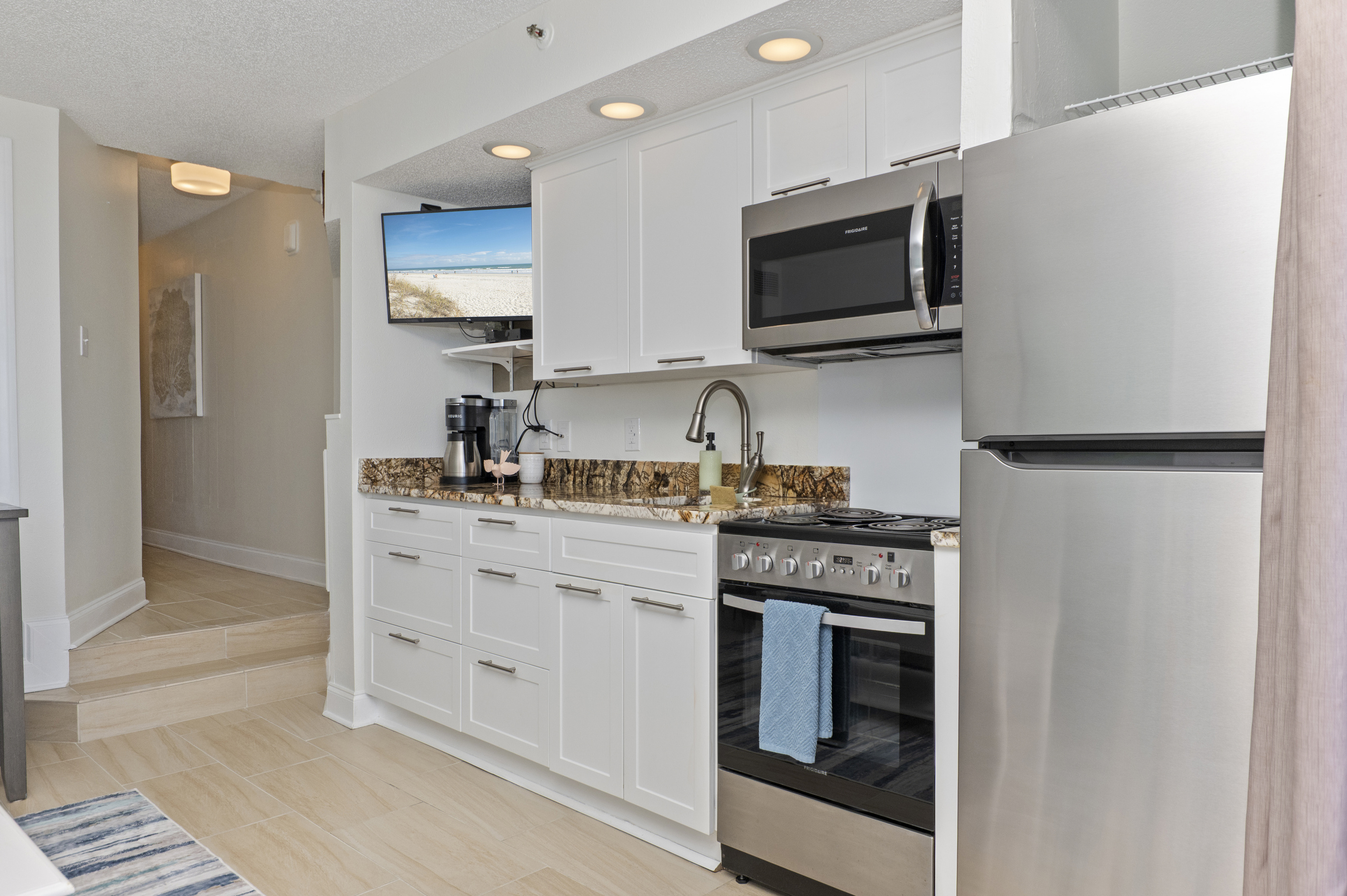Convenient to go out to eat and stay in and cook in the condo. Full-sized refrigerator, microwave, oven/stove, and coffee options for pot or k-cups. 