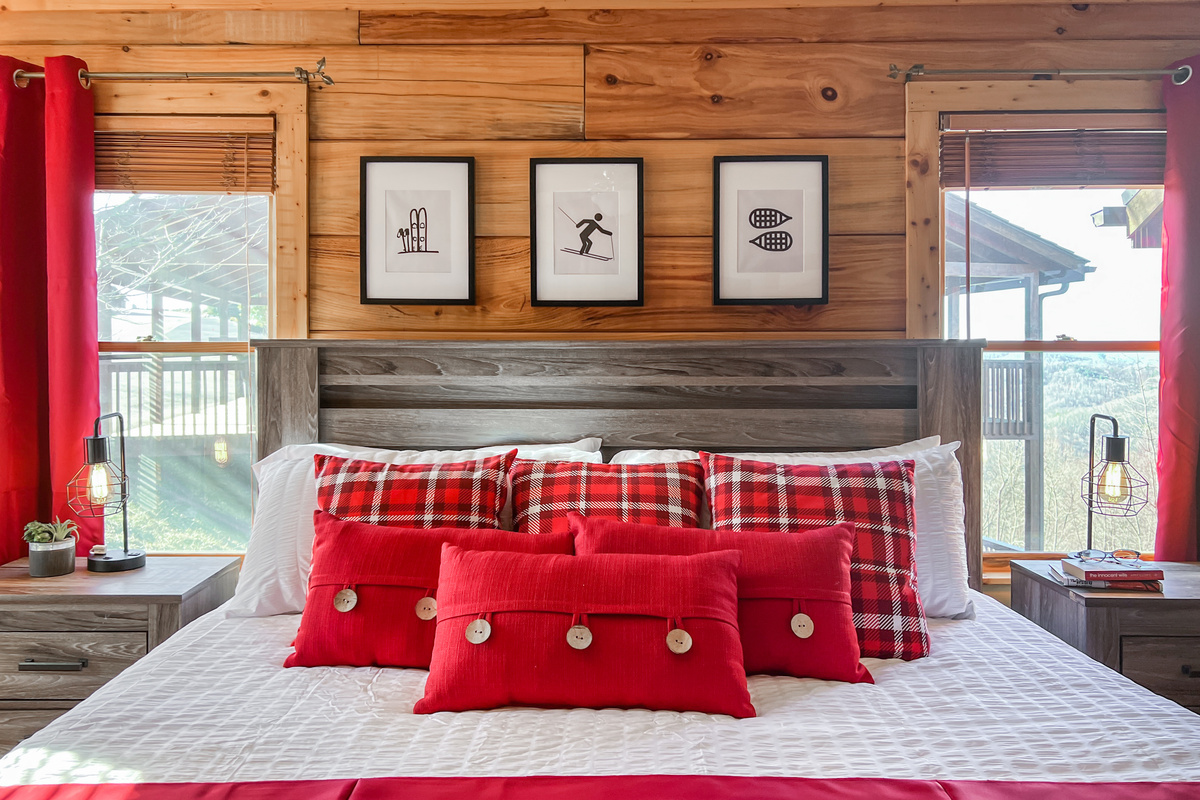 Main-floor Ski Room with a king bed, convenient access to the kitchen, living areas, full bathroom and main deck.