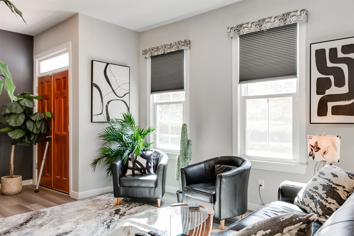 Living Room: Bright and inviting space with stylish decor, perfect for relaxation and gathering!