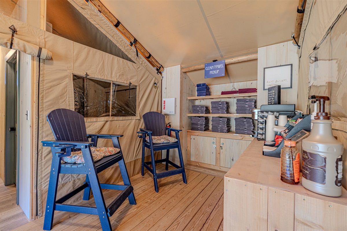 Recharge and refresh. Stop by the campground's cashless store for your morning caffeine fix, grab a fresh towel, and take a moment to relax in the shade before your day begins.