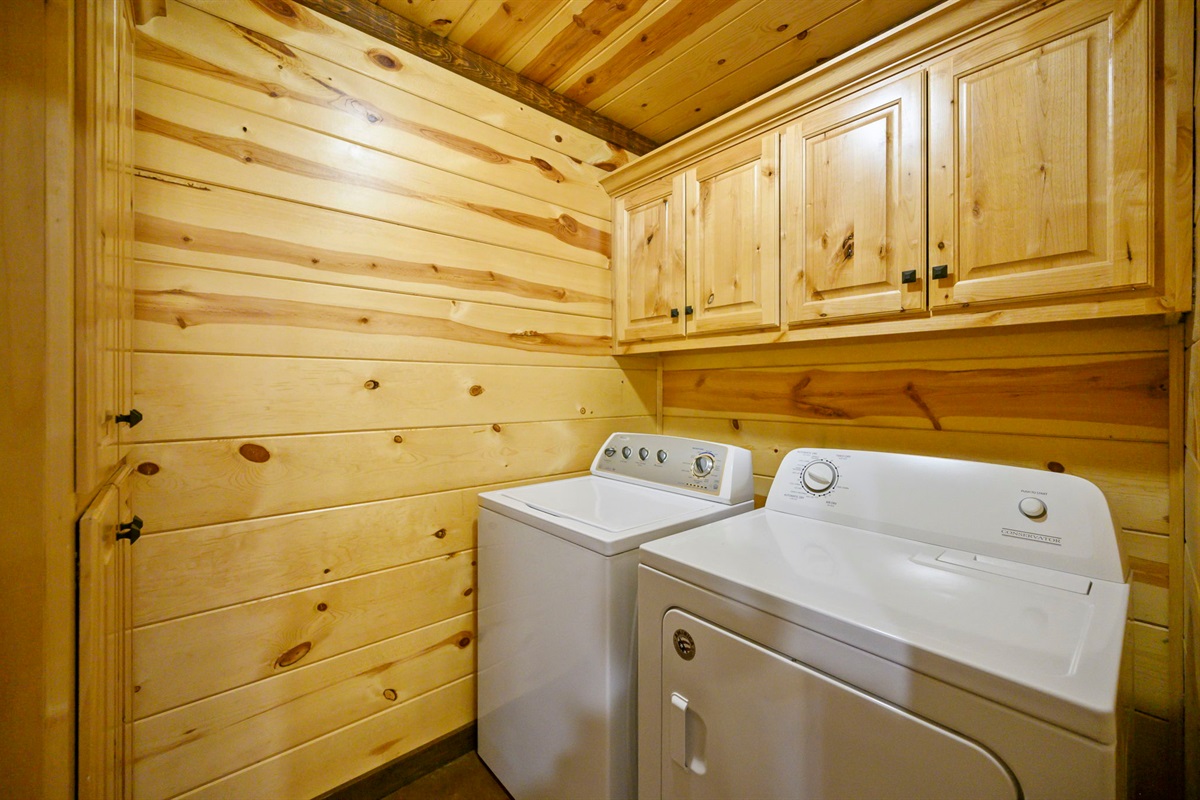 Full size washer and dryer  in the laundry room