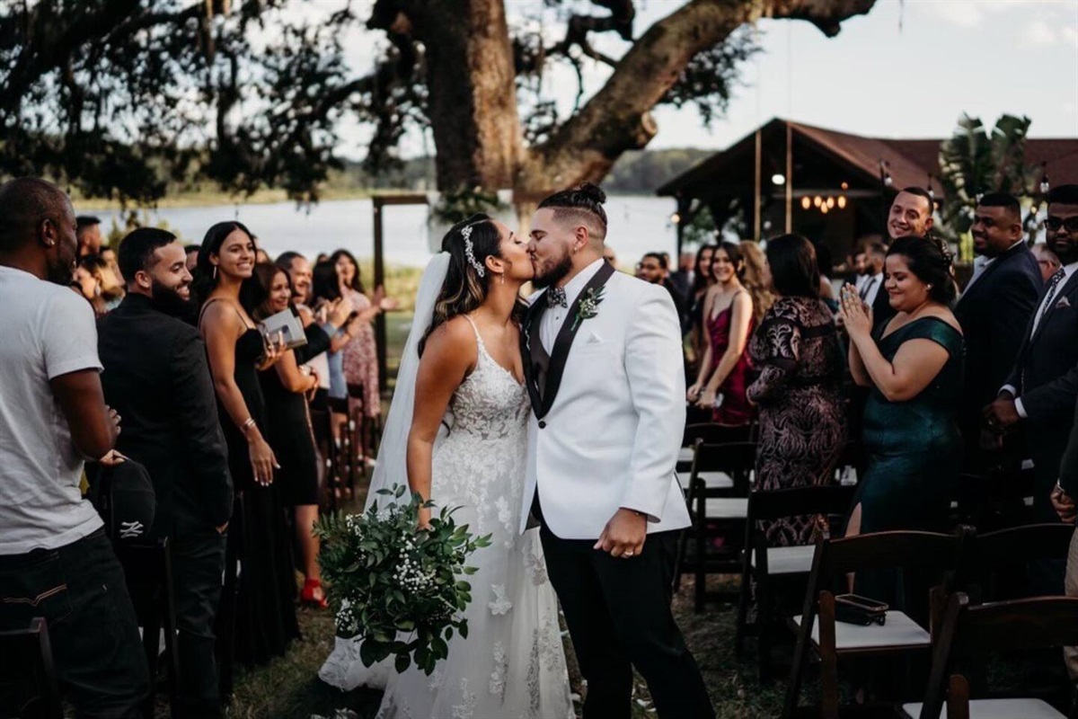 Say I do beneath the oaks with lake views, ideal for romantic outdoor weddings and receptions.
