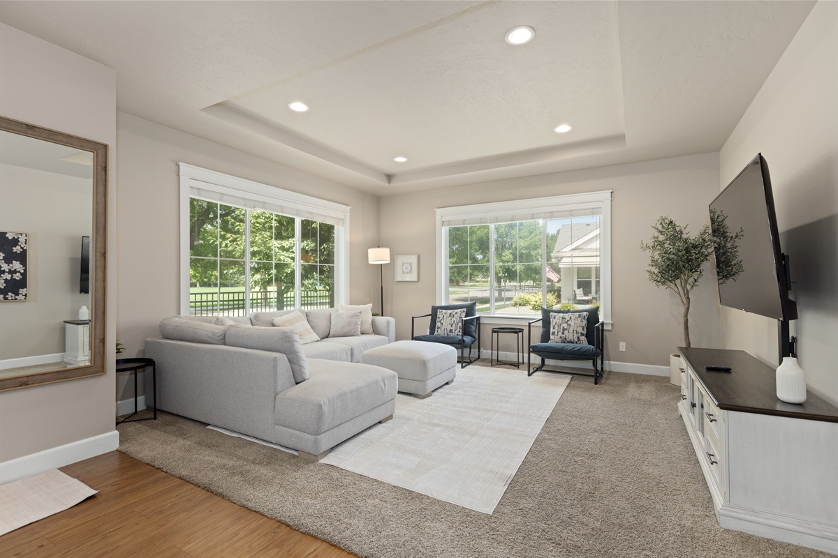 Cozy living room with plush seating for movie nights.