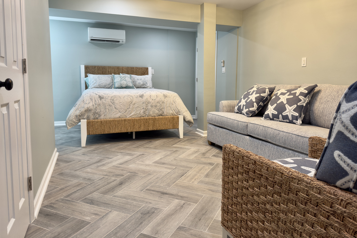 Private suite with living area and en suite bathroom.