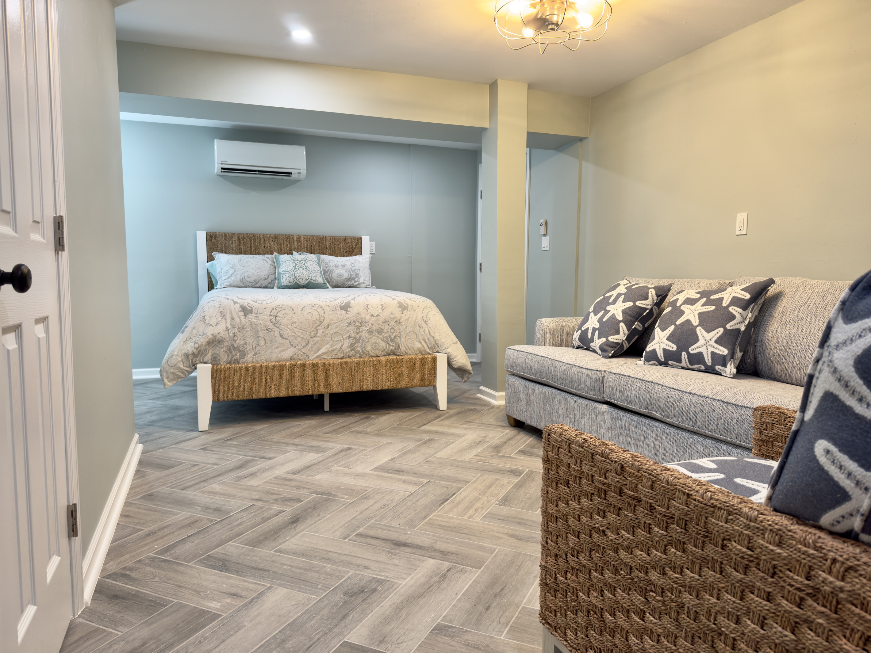 Private suite with living area and en suite bathroom.