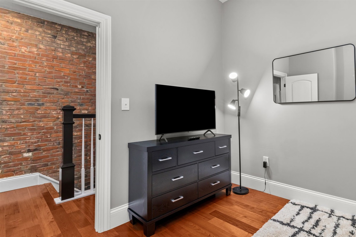 Bedroom two provides space for storing your belongings in the dresser or spacious closet and also has a dedicated Smart TV.