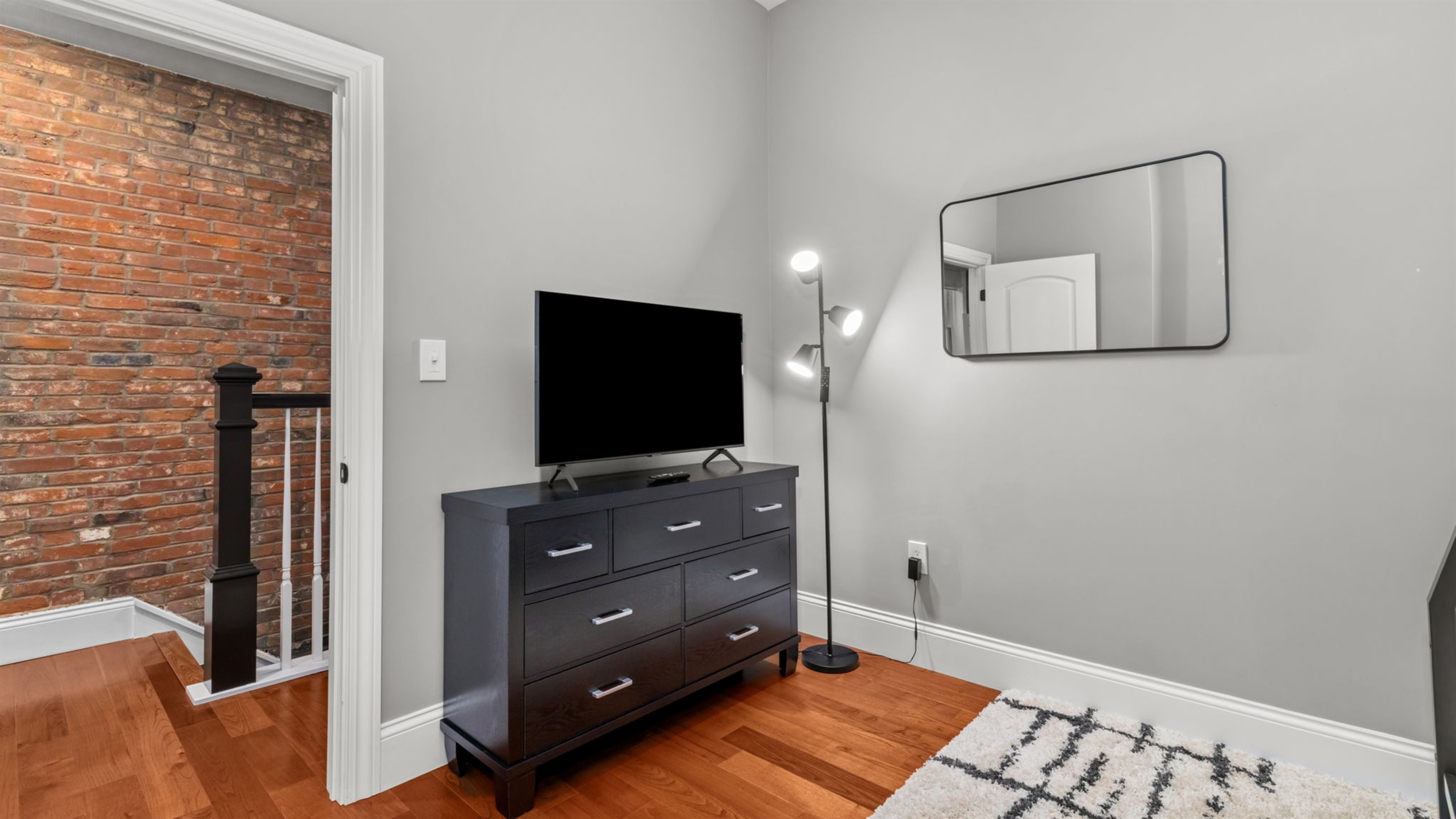Bedroom two provides space for storing your belongings in the dresser or spacious closet and also has a dedicated Smart TV.