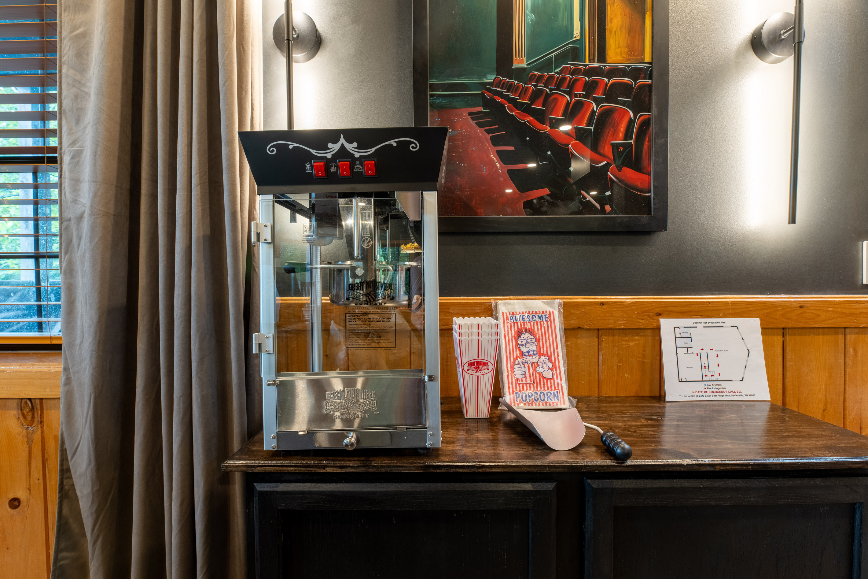 Pop some popcorn and watch movies in the theater room!