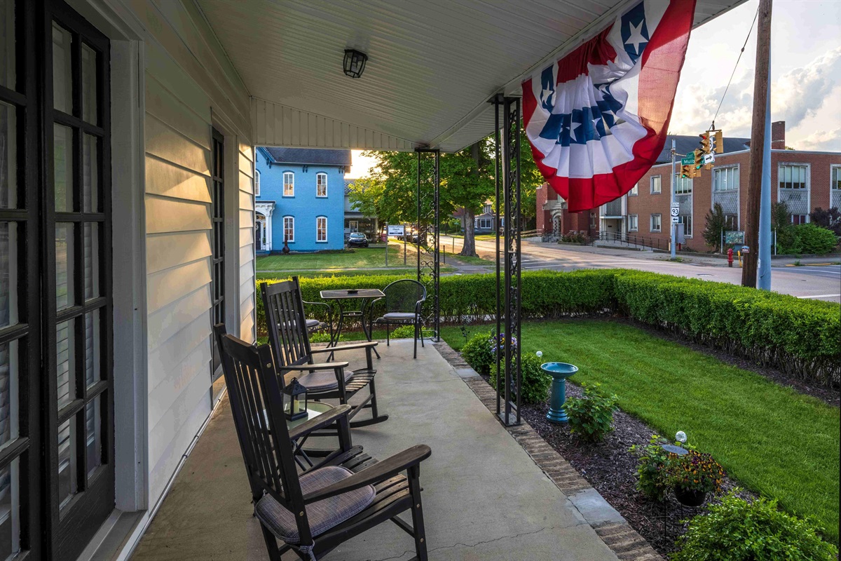 Rock on the porch or sit at the table and enjoy the beautiful outdoors!