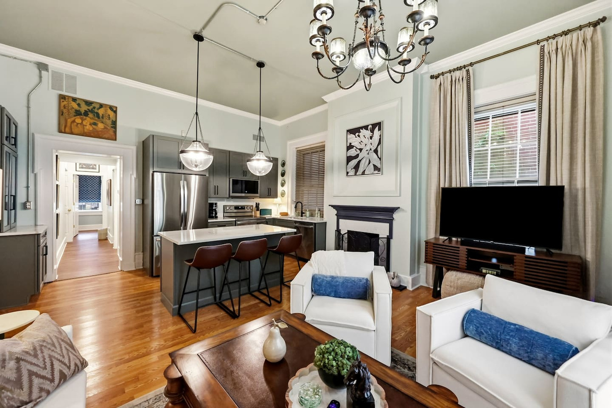 Large kitchen and living area with soaring 12-foot ceilings. 