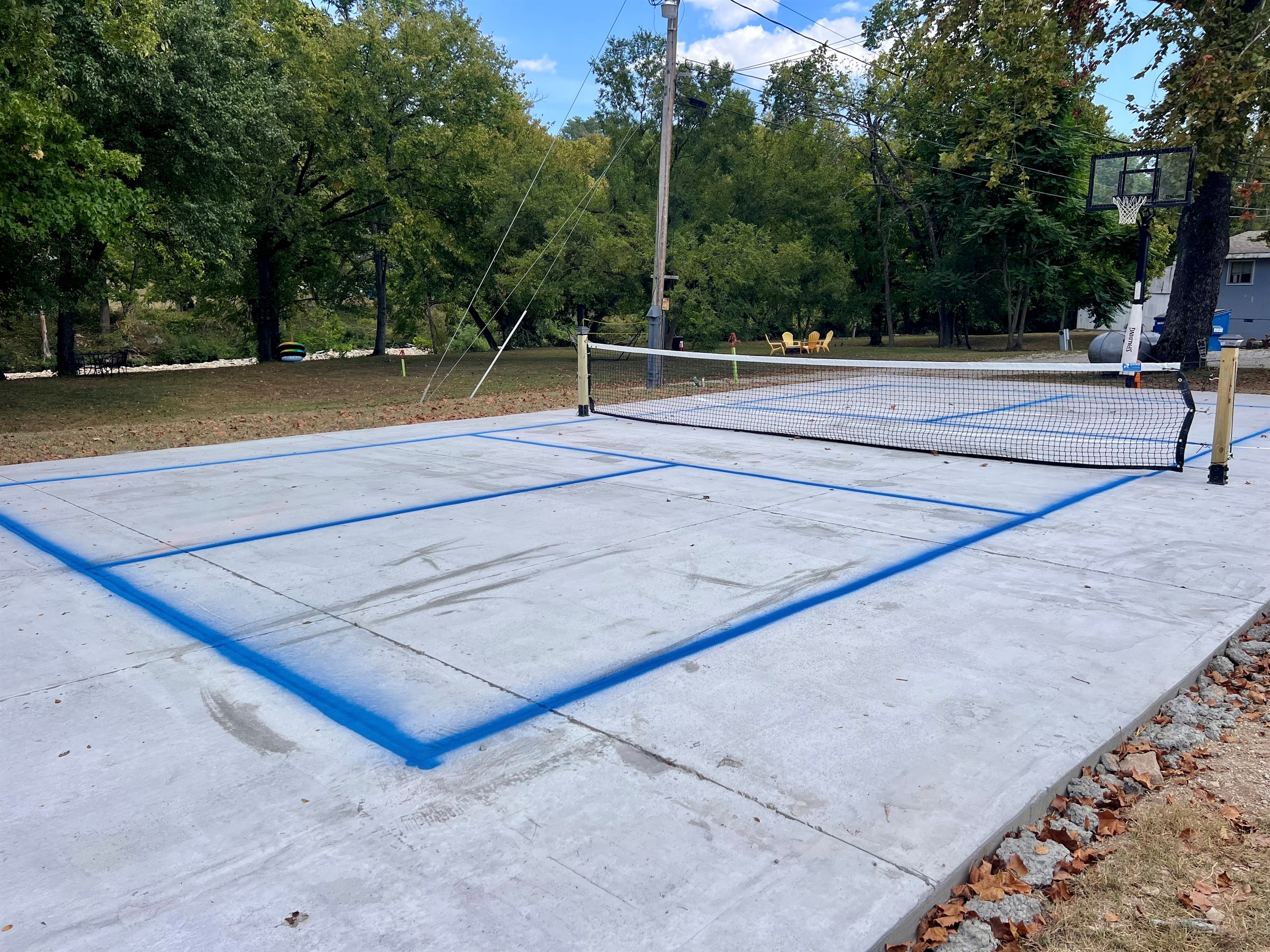 Pickleball paddles and balls are in the grill area for your use.