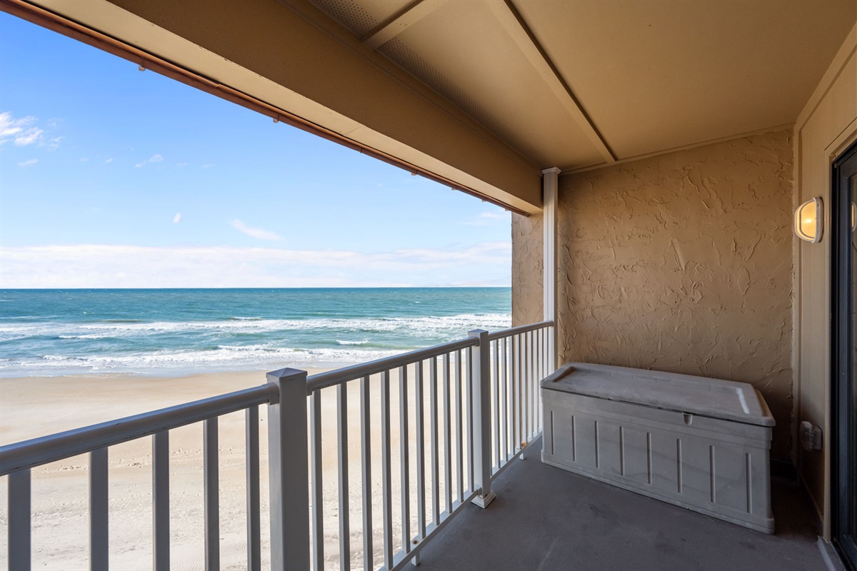 Covered oceanfront balcony with uninterrupted views and extra storage for your beach gear