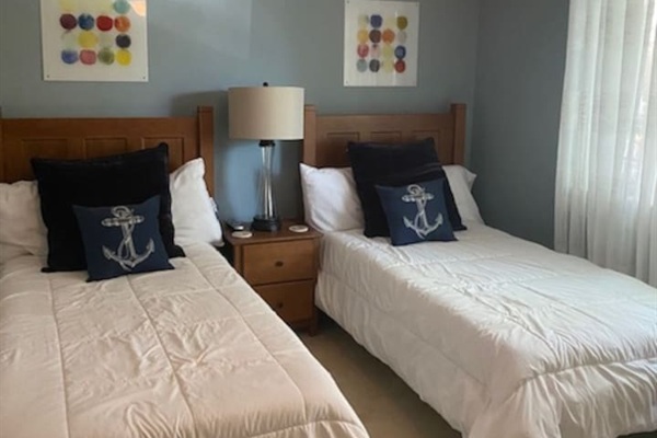 This bedroom has a shared Jack & Jill bathroom with bedroom #2