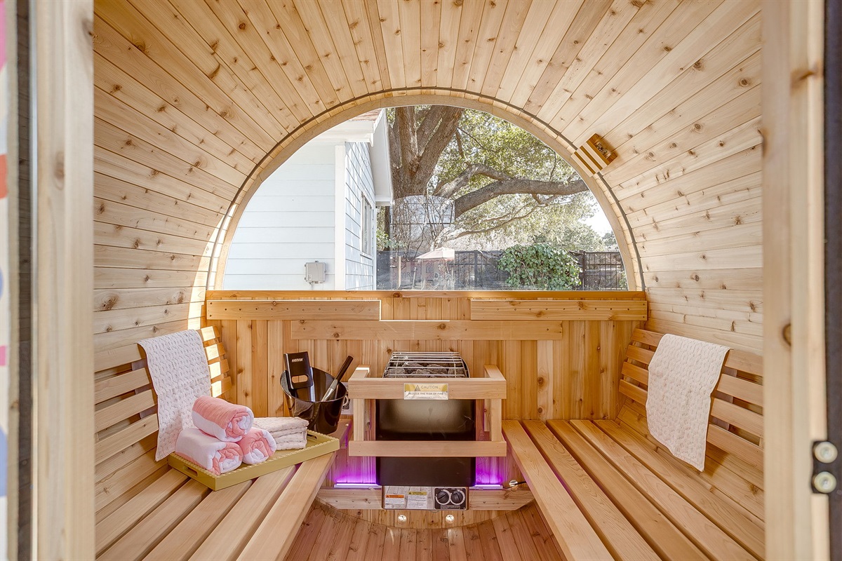 Barrel sauna interior with warm wood finishes