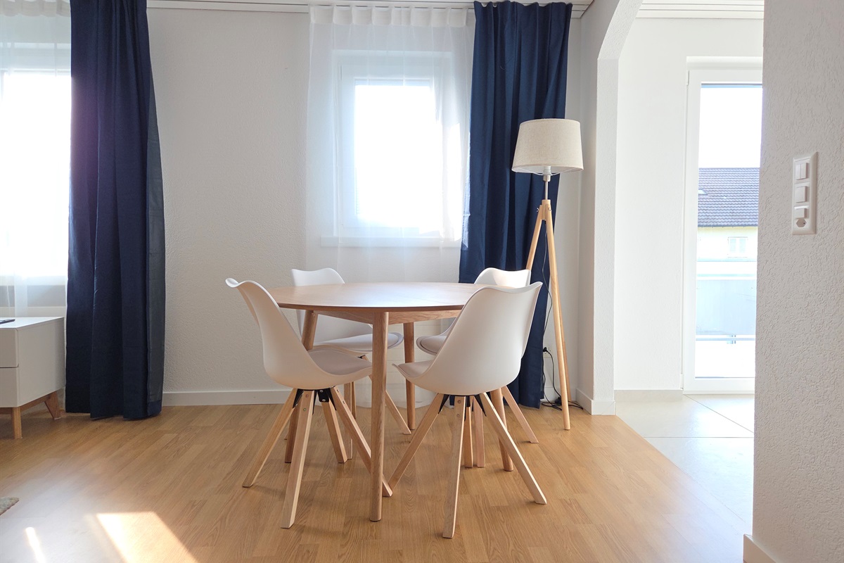Dining area between kitchen and living room