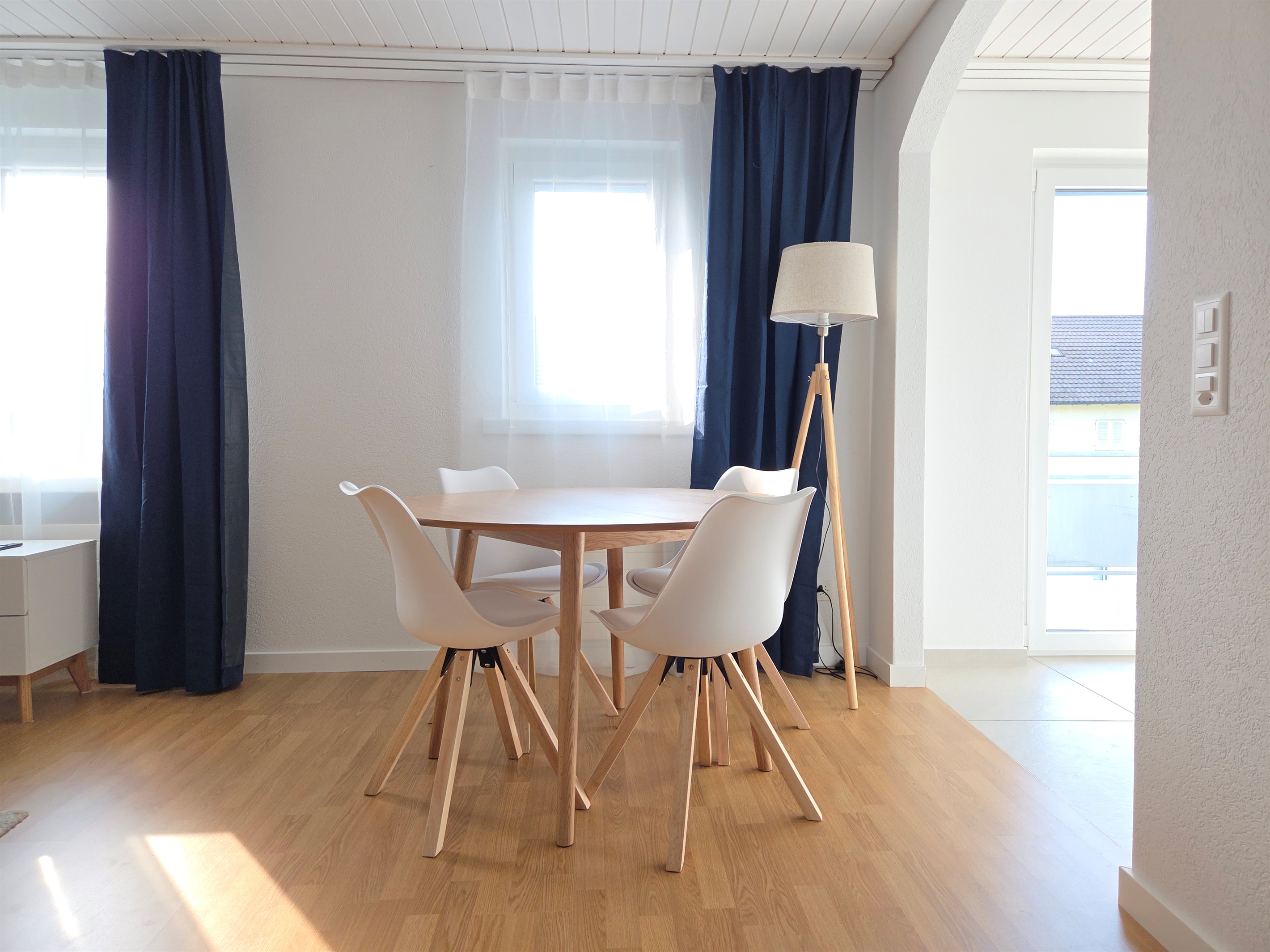 Dining area between kitchen and living room
