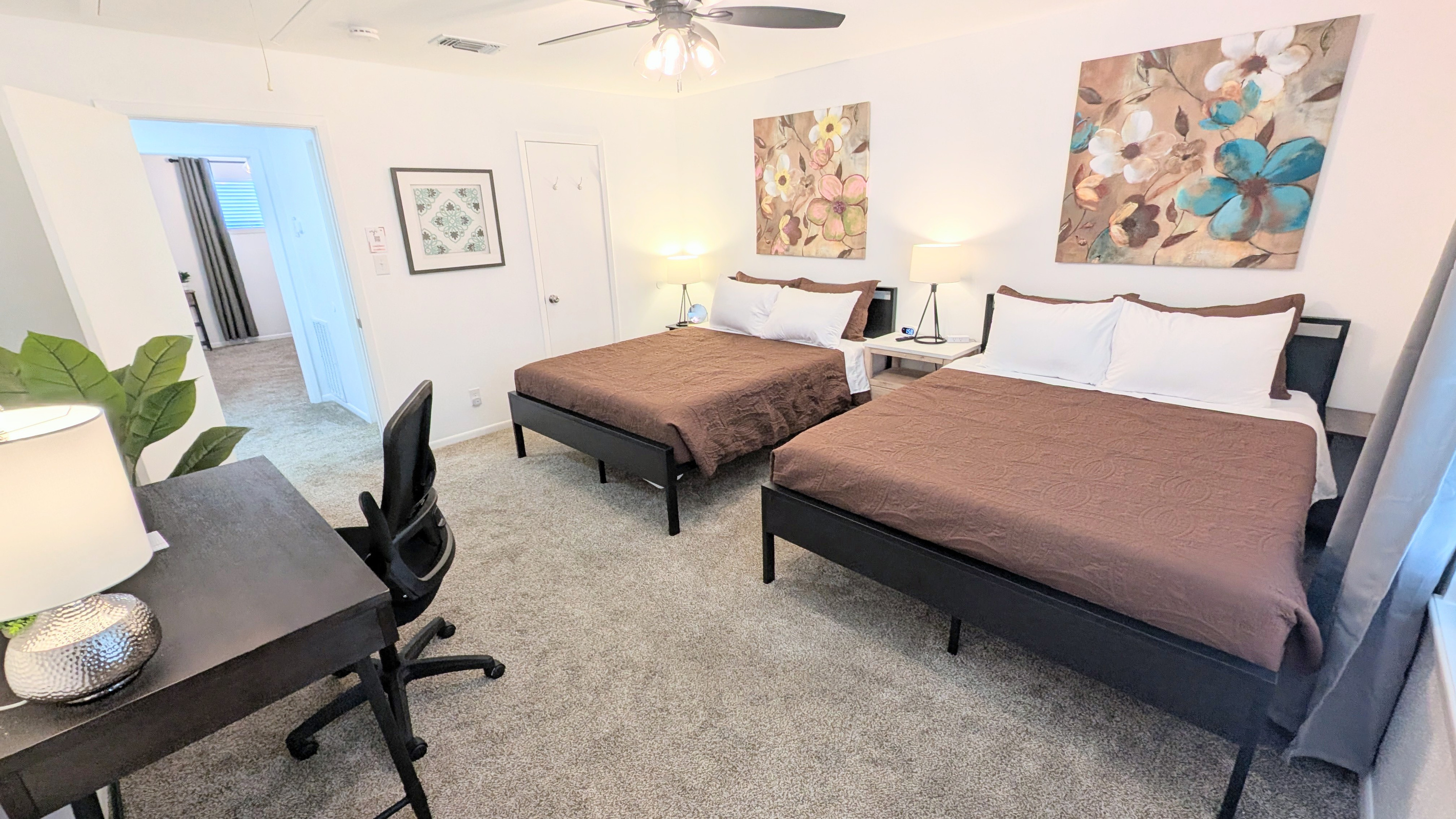 This bedroom features direct access to the bathroom, along with a large closet for ample storage.