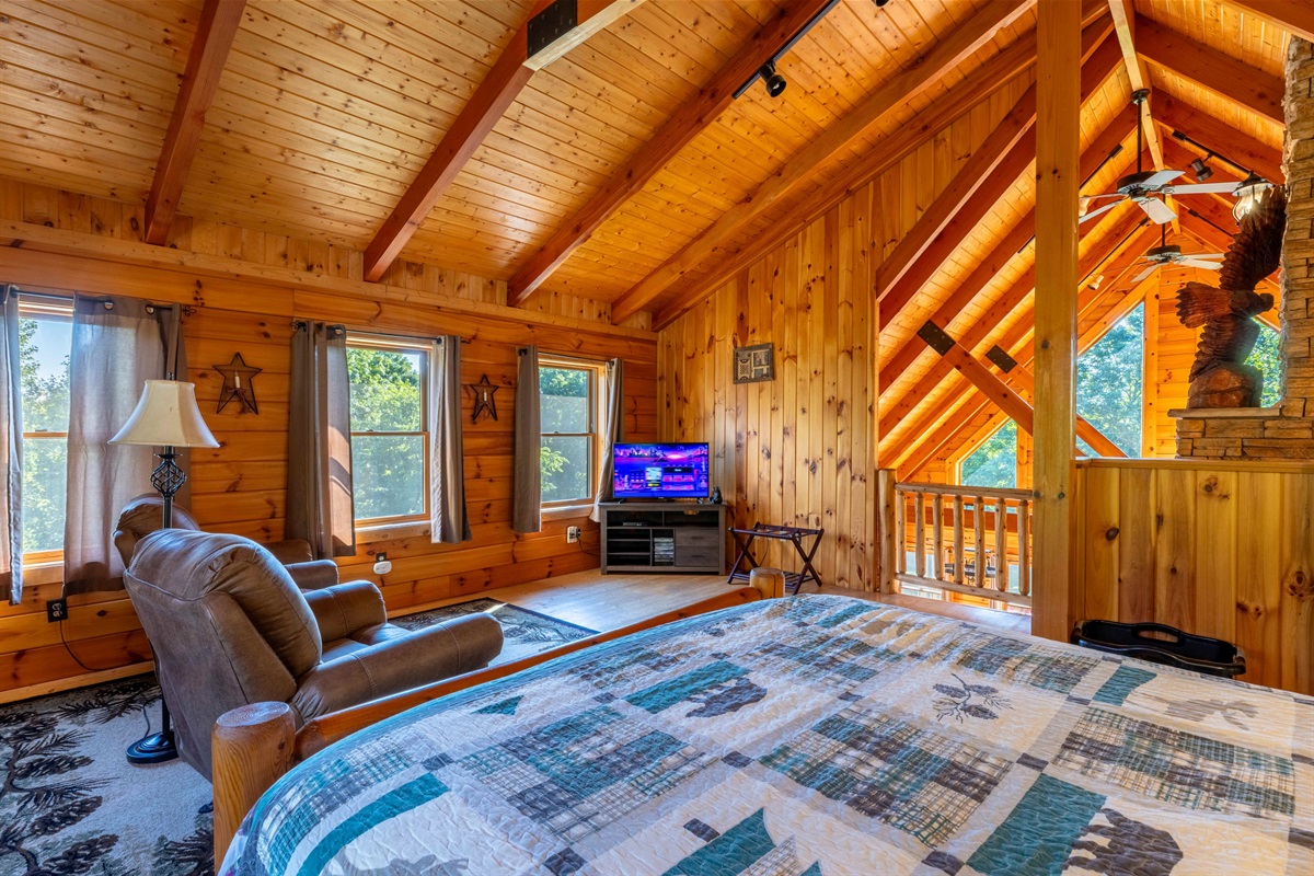 Nice sitting area with tv in the upstairs loft bedroom