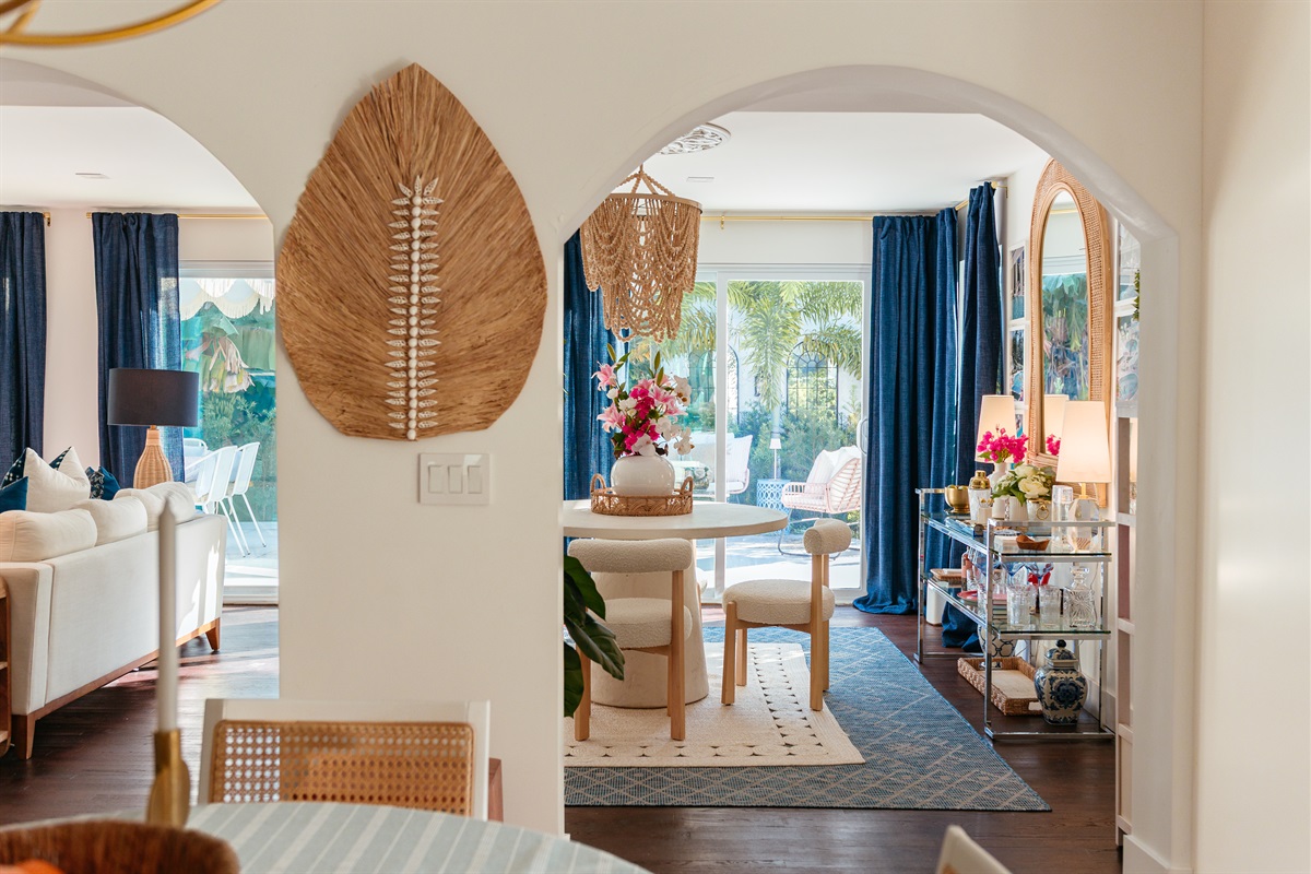 As you journey from the front of the house to the rear, a lovely, tasteful bar area awaits your visit - where many conversations and drinks can be had together.