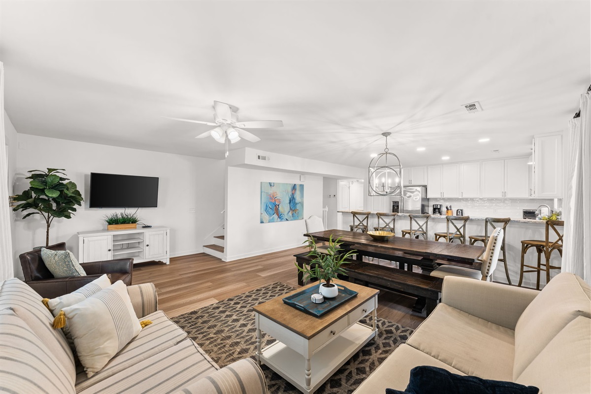 Side A: Modern 2nd-floor hub for shared meals and relaxing after the beach.