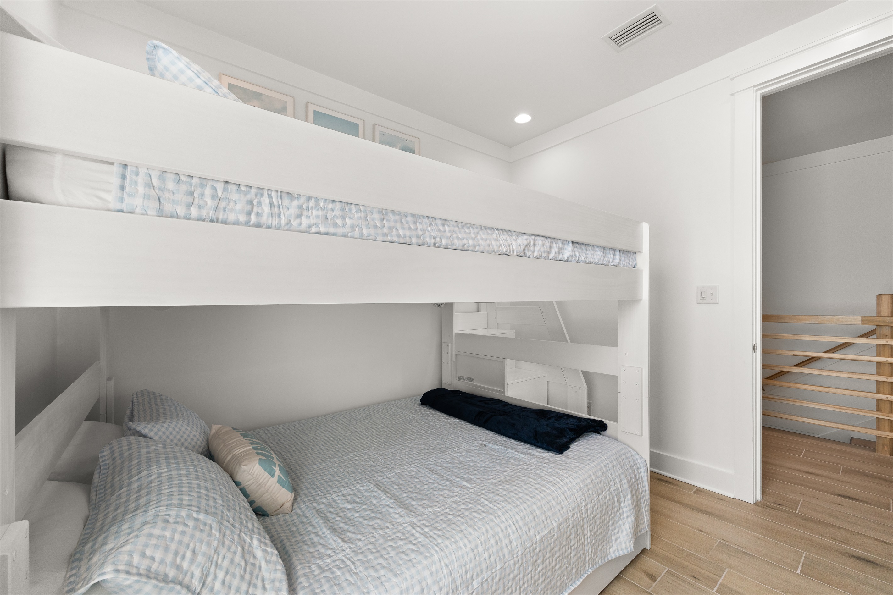 Designed with comfort and convenience in mind, this inviting bunk room provides a fun and welcoming retreat for kids, teens, or additional guests.