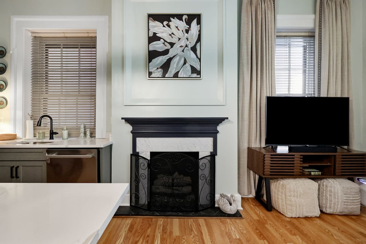 Smart TV in the living room of the Bell-Smith Suite. Fireplaces are for aesthetics only.